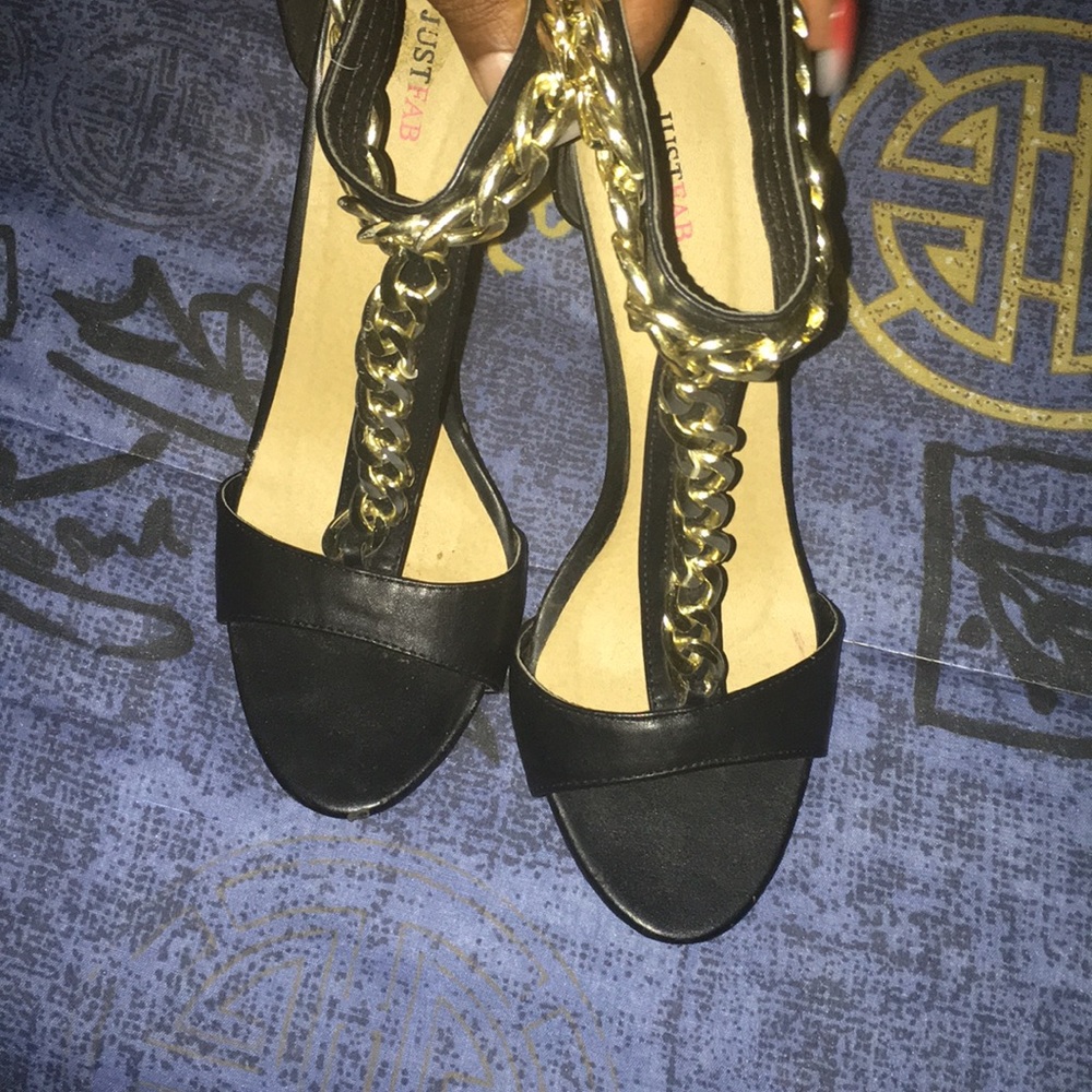 Authentic Just Fab Black and Gold Pumps.